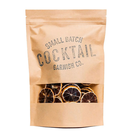 A bag of Cocktail Garnish Co. Dried Lemon Wheels with 50+ slices in each bag.