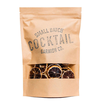 A bag of Cocktail Garnish Co. Dried Lemon Wheels with 50+ slices in each bag.