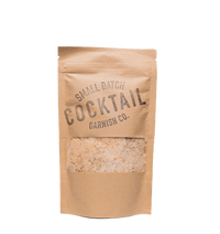 A bag of Cocktail Garnish Co. Pink Himalayan Salt mixed with Dehydrated Blood Orange for rimming cocktails