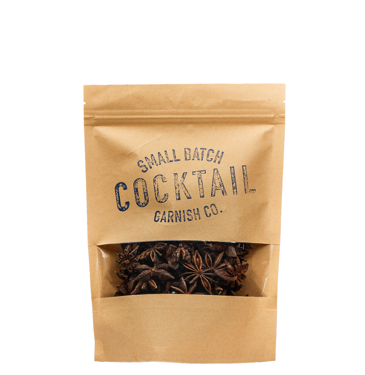A small kraft paper stand-up pouch with a clear window showing dried star anise inside. The pouch is printed with the text 'SMALL BATCH COCKTAIL GARNISH CO.